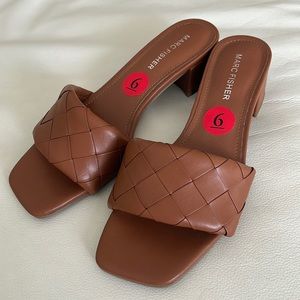 Heeled sandals, never used.